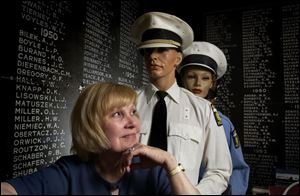 Police Sgt. Karen Sue Martensen hopes to find a permanent home for these mannequins modeling police uniforms, as well as a 1946 paddy wagon and other memorabilia.