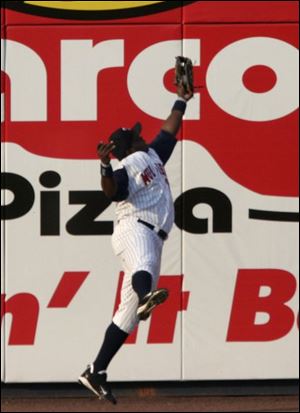 Toledo's Byron Gettis chases down this potential extra-base hit off the bat of Charlotte's Raul Casanova in the second inning at Fifth Third Field.