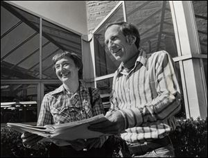 Louise Bankey, left, and Elliot Tramer, who helped organize Toledo s first Earth Day activities, are shown near the UT campus greenhouse.