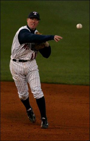 Toledo shortstop Kevin Hooper makes a throw to first base.
Hooper had two errors last night.