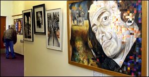 Steve Harris of Bowling Green has a closer look at one of the artworks, which were spread among more than 25 buildings. 