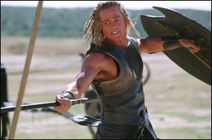 Some of the more graphic portions of Brad Pitt s movie Troy were edited out in the  sanitized  version
of the fi lm, and Hollywood studios and directors are incensed about the practice.
