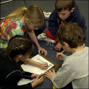 From left, Shannon Rosenlieb, Andrea Wertz, Tyler Harrington, and Andrew Smith, all 9.