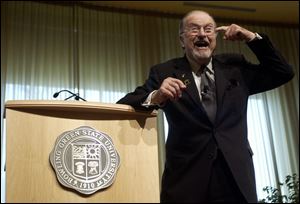 Business consultant Frank Maguire enlivens his presentation at BGSU with an anecdote and some animated gestures.