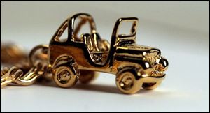 A Jeep charm such as this one at Broer-Freeman Jewelers may be a fun way to show civic pride.