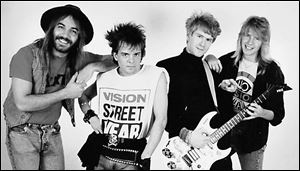 Introduced in 1981 at St. John s Jesuit High School, The Stain
was composed of, from left, Mark Mikel, Scott Snyder, Jon
Stainbrook, and Jeff Kollman.
