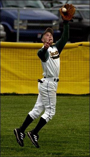 Start senior right fi elder Kevin Neilly leaps to make a catch in the district semifinal win over St. Francis. He is hitting .453.
