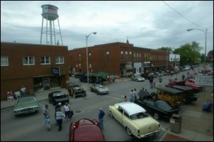 NBR pember02p 02 --  Cars line Front St during the first of four Cruisin' Nites of the summer in Pemberville, which is host to the car show the first Thursday of every month, takes place on Thursday, June 2. More than 125 cars were on display at this months night. The Blade/Alyssa Schukar