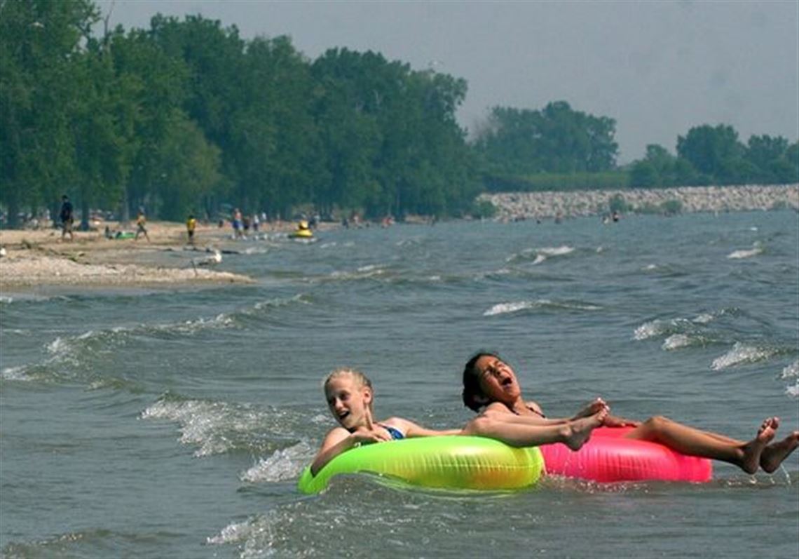 NBR sterling05p 6 Monroe, MI residents Halle McCloskey, left, and her friend, Cara Lucio, both 11, enjoy the beach while staying at the campground at Wm. C Sterling State Park in Monroe, MI, June 5, 2005. The Blade/Lori King