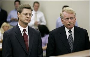 Brian Hicks, left, Gov. Bob Taft's former chief of staff, appears in Columbus Municipal Court with attorney John Ziegler. Mr. Hicks pleaded no contest to a misdemeanor ethics charge.