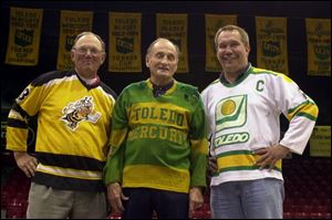 Mike Greeder, right, took part in a celebration of Toledo hockey with Dino Mascotto, left, and Norm Grinke in 2001.