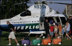 REG nightout02p during National Night Out at City Park in Bowling Green, OH., Aug. 2, 2005.  The Blade/Lori King
