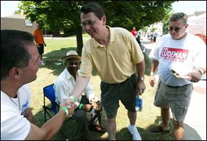 Rob Ludeman meets fair-goers at July's Polish Festival.