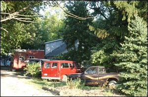 Huron County deputies found 11 children locked in cages in this Clarksfield Township home.
