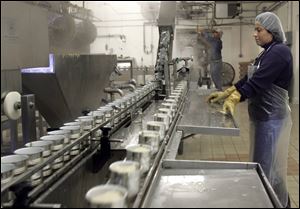 Annete Salinas works on the production line in the Fremont Co. s processing plant.
