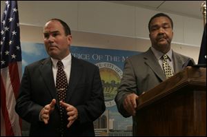 Police Chief Mike Navarre and Mayor Jack Ford.