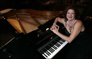 Jazz vocalist Lisa Lynn will perform three shows tomorrow night at Murphy's Place, 151 Water St. in downtown Toledo. The first show begins at 9 p.m. Times for the other two have yet to be determined. Tickets are $10 and $15. Information: 419-241-7732.
