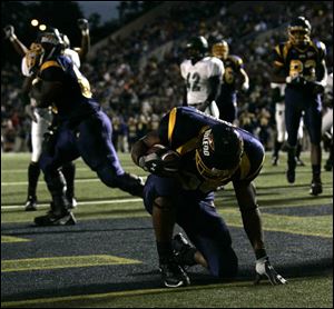 Toledo running back Trinity Dawson, injured last season, settled for 999 yards rushing in 2003.