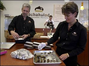 Mark and Linda Powles say business at their shop has been good but they hoped it would be better. 