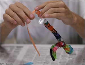Art courses at the juvenile detention center provide youthful offenders with a potential new career field that the youngsters may never have considered, justice officials say.