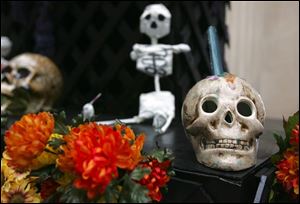 The altar includes hand-made flowers.