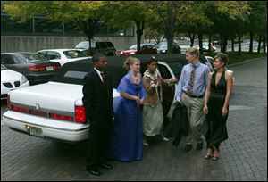 Dajuan Mitcham, Tonya Leu, Marjory Turner, Nicholas Duty, and Juliana Barton arrive by limousine for the Triumph Award presentation dinner at the Wyndam Hotel downtown.