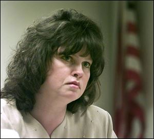 Carolyn Smithers settled for $35,000 after she claimed then-Mayor Carty Finkbeiner hit her with a ceramic mug.