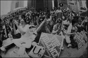 Women attend a 1995 speech in Columbus by Patricia Ireland, president of the National Organization for Women.