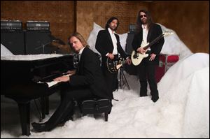 From left, Bob Kinkel, Al Pitrelli, and Paul O Neill of the Trans-Siberian Orchestra.
