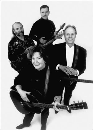 Linda Williams and her husband,
Robin, right, will be accompanied
by Jimmy Gaudreau, top, and Jim
Watson Saturday at the Ritz Theatre in Tiffin