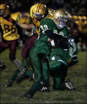 Dan Caldwell scores his second touchdown of the game   and the season   as St. Mary Catholic Central romped.
