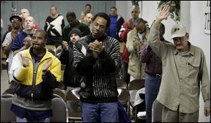In the front row for Eli s concert at Toledo Restoration Church are, from left, Raymond Whitley, Orlando Corbin, and Cruz Hernandez.
