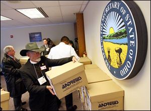 Members of Tobacco-Free Ohio drop off boxes of petitions with 165,000 signatures at the Ohio secretary of state s office.

