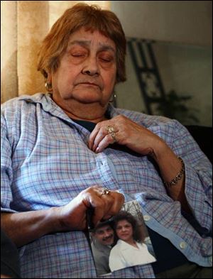 Mary Leal, mother of Gilbert Leal, of North Toledo mourns her son and asks the community to help solve his slaying.