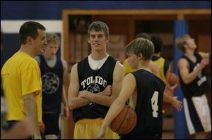 Toledo Christian coach David McWhinnie talks to Nate Ensey,
center, and Ryan Mathewson.
