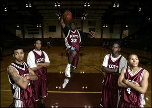 Scott s talented roster includes, from left, Terry Sandridge, Grant Maxey, Marcus Outlaw, Stephen Woodley and Kyle Lightner. Sandridge
and Outlaw transferred from Libbey and Maxey transferred from Start, making the Bulldogs the City League favorite.
