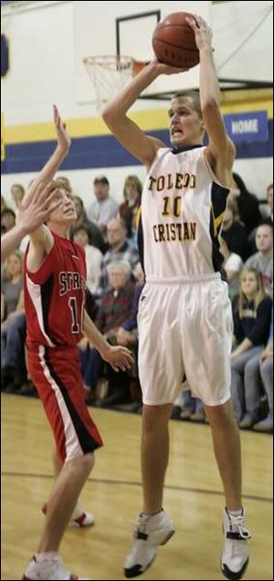 Toledo Christian senior forward Kyle Bensch goes up for a shot in last night's victory over Cardinal Stritch. Bensch finished with 14 points.
