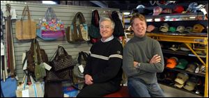 Kent, left, and Shawn Rogers have expanded their company's merchandise from hats and caps to bags, jewelry, footwear, and belts.
