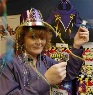Michelle Carroll, manager of Phantom Fireworks, Curtice, is ready to make some noise to welcome in 2006.