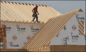 This Bedford Township house was among that jurisdiction's 159 permits last year.