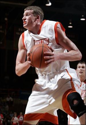 Erik Marschall played four years under his father at New London (Ohio) High School. He is averaging nine points and five rebounds a game for Bowling Green.
