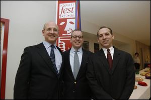 Brothers Phil, left, David, and Joel Andryc at 'Knightfest: A Celebration of the Arts' at St. Francis de Sales High School