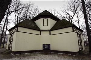 The building at left is now used to store park benches, but has little other purpose.