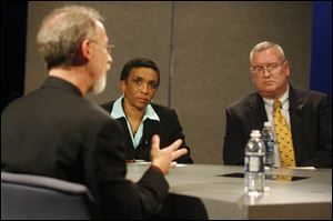 Bill Donnelly of the Chilrden's Resource Center, left Janet Taylor, Bowling Green High School guidance counselor, and principal Jeff Dever discuss suicide prevention on WGBU-TV.