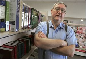 Bill English and his wife Annette quit their professions to become owners of the Good News Christian Bookstore in Northwood because he was told by God,  This is what I want you to do. 
