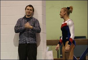 Springfield coach Kristian Ilstrup talks to Ashley Grant, who finished second in all-around at the Northern Lakes League meet.
