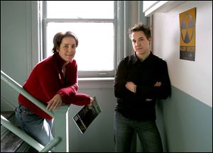 Jen Angel, left, and Jason Kucsma edit Clamor from a downtown Toledo office.