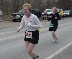 Lorrie Cesarz at 13.1 relay exchange.