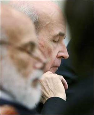 The Reverend Gerald Robinson listens to testimony.