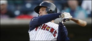 Maxim St-Pierre strikes out during last night's Mud Hens game against the Norfolk Tides at Fifth Third Field. St-Pierre was 1-4 with an RBI in Toledo's 6-4 loss.
